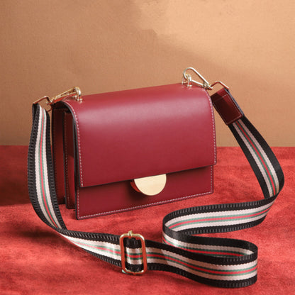 2025 summer new urban simple luggage leather goods solid color small square bag leather sewing line women's messenger bag