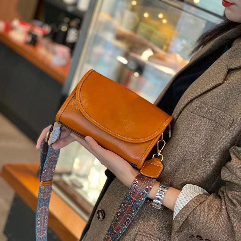 2025 summer new leather oblique span small bag women's casual versatile cover wide shoulder strap shoulder bag cowhide women's bag