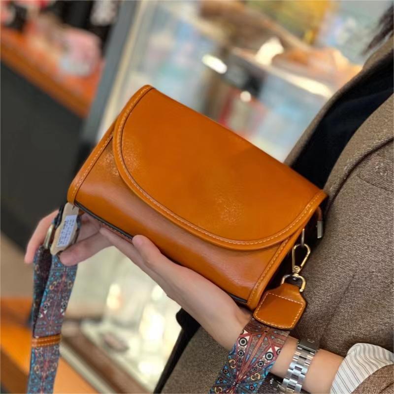 2025 summer new leather oblique span small bag women's casual versatile cover wide shoulder strap shoulder bag cowhide women's bag